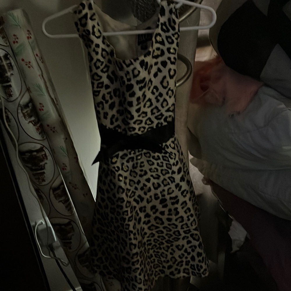 Leapord skin dress worn once we matched . Perfect condition 15 size 5